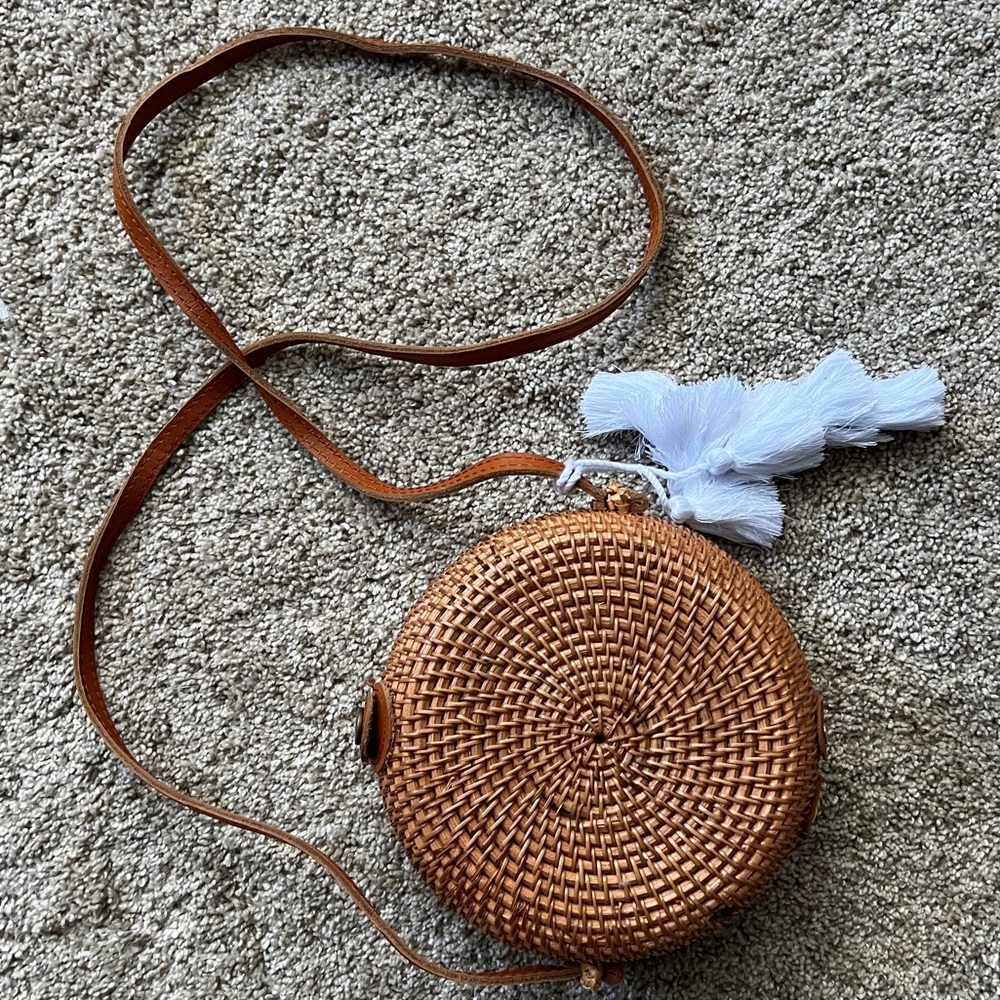 Woven Oval Rattan Crossbody Purse With Leather-Look Strap And White Tassles